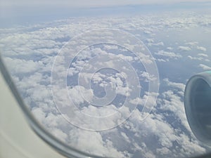 above clouds flying high