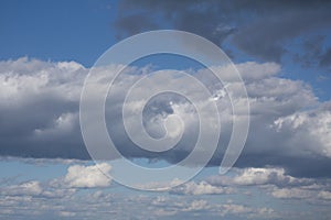 Above the clouds the view of different cloud formations covering remote mountains can be used for background.