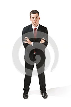 Above front portrait of a businessman with very serious face. Confident professional with piercing look in the