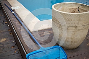 above ground swimming pool with a ceramic vase and mesh, outdoor shot