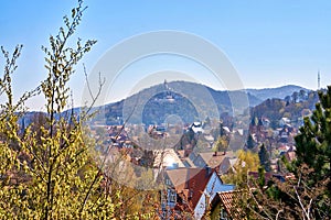 Above the roofs of Wernigerode with a castle in the mountains in the background. Saxony-Anhalt, Harz, Germany