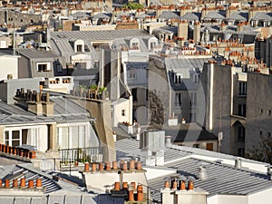 Above the rooftops of Paris, detail view with the many red chimneys typical of Paris