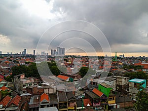 From above see so many houses, buildings, under the clouds are so beautiful. Surabaya,Indonesia
