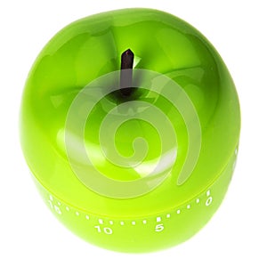 Above view of apple shaped green timer on white