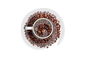 Above view of a coffee cup filled with coffe beans