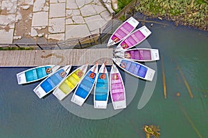 Above view of colored docked boats