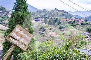 above view of Dazhai village on green hills