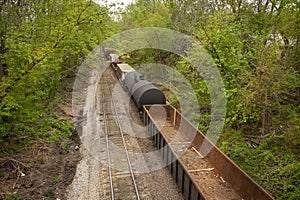 Above view of empty train cars and railway container cars on tracks