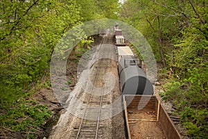 Above view of empty train cars and railway container cars on tracks