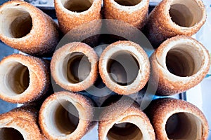 Above view of group of KÃ¼rtÃ¶s kalÃ¡cs, typical romanian and hungarian sweet horn shaped bread, common in east europe pastry