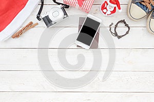 Above view of image items to travel with decorations Merry Christmas & Happy New Year background
