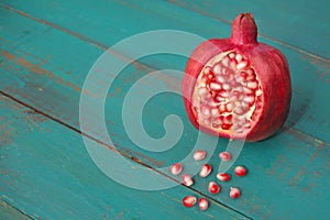 Above view of one Pomegranate Fruit and seeds
