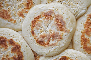Above view of Pikelets food abstract background