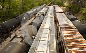 Above view of train cars on multiple tracks at a rail yard