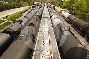 Above view of train cars on multiple tracks at a rail yard