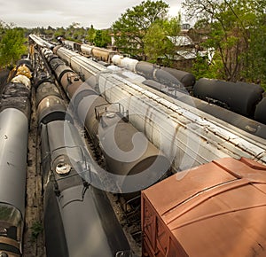 Above view of train cars on multiple tracks at a rail yard