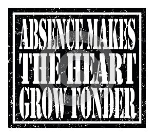 ABSENCE MAKES THE HEART GROW FONDER, text written on black stamp sign