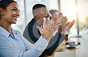 Absolutely amazing. a group of young businesspeople applauding while sitting in the conference room during a seminar.