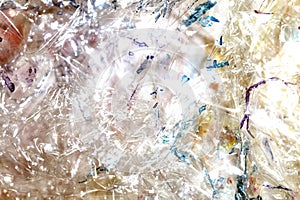 Absract background of shiny plastic and bubbles dreating bright sci-fi style texture background