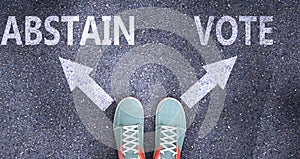 Abstain and vote as different choices in life - pictured as words Abstain, vote on a road to symbolize making decision and picking