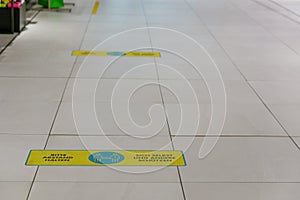 ` Abstand halten ` means `keep distance` on the floor inside supermarket in Germany