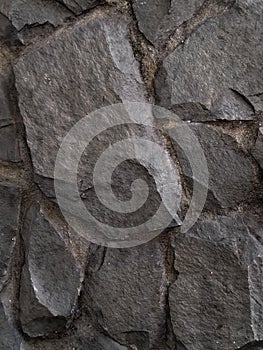abstrack background of dark stone rock.