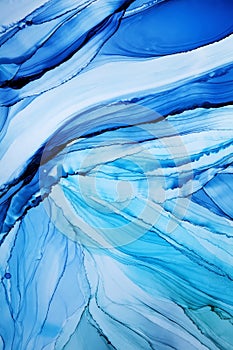 Abstract alcohol ink art drawing background in blue