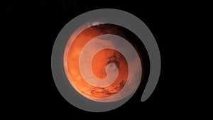 Abstract animation of red planet covering with ice and rotating on the black background. Animation. The process of