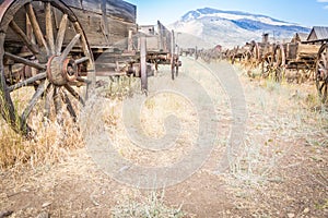 Abstract of Antique Wood Wagons and Weathered Old Wagon Wheels.