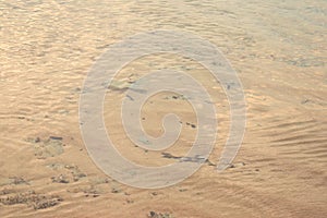 Abstract Aqueous Natural Background - Transparent Shiny Water with Ripples on Surface with Underwater Sand