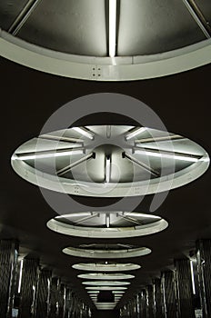 Minimalist futuristic interior. Round design of lighting on the ceiling