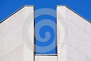 Abstract architectural street light post detail isolated with blue sky background