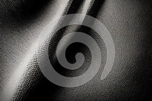 Abstract art background featuring black cloth with desaturated particles and animated textures. A striking design for wallpaper photo
