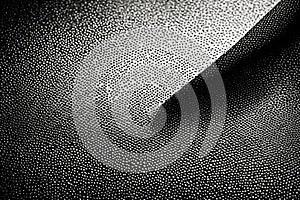 Abstract art background featuring black cloth with desaturated particles in motion. Animated texture creates a visually photo