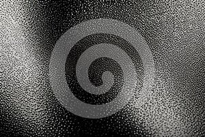 Abstract art background featuring black cloth with desaturated particles in motion. Animated texture creates a visually photo