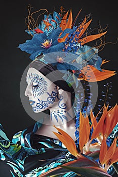 Abstract art collage of young woman with flowers photo