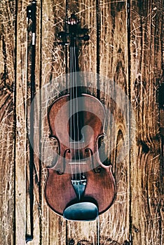 The abstract art desig nbackground of  wooden violin and bow
