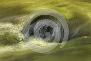 Abstract art of motion blur water surface on the rock natural color painting and design