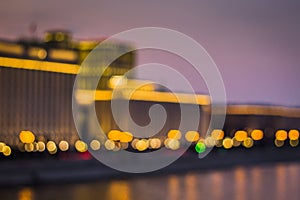 Abstract artistic photo: blurry cityscape with streetlights