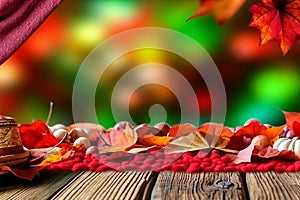 Abstract autumn background - leaves in autumn coloring on a wooden table