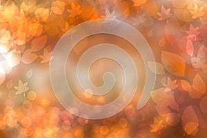 Abstract autumn gradient gold orange bright green of fall colors background texture with leaves bokeh circles and sun rays. Indian