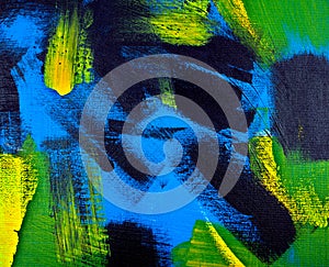 Abstract background. Acrylic black, yellow, blue, green colors. Painting on canvas. Handmade, hand drawn.