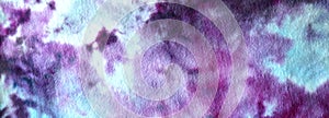 Abstract Background Banner of Blue and Purple Tie-Dye Swirls on Fabric