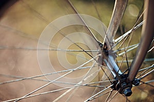 Abstract background with a bicycle wheel with bokeh