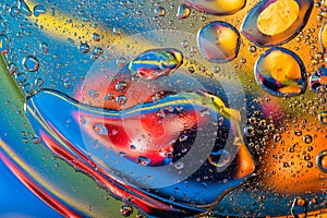 Abstract background with big and small oily drops