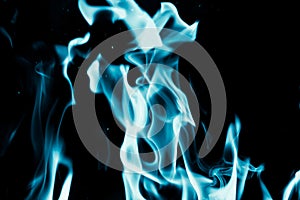 Abstract background of blue flame fire on black background