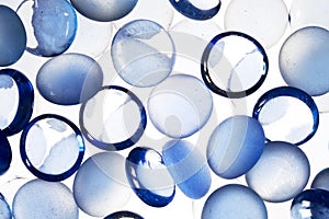 Abstract background from blue glass pebbles