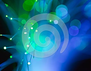 Abstract background of blue and green spot lights