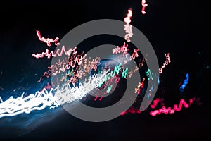 Abstract background blurred colored marks from fast moving cars night