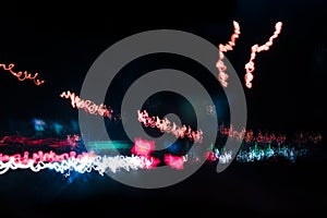 Abstract background blurred colored marks from fast moving cars night